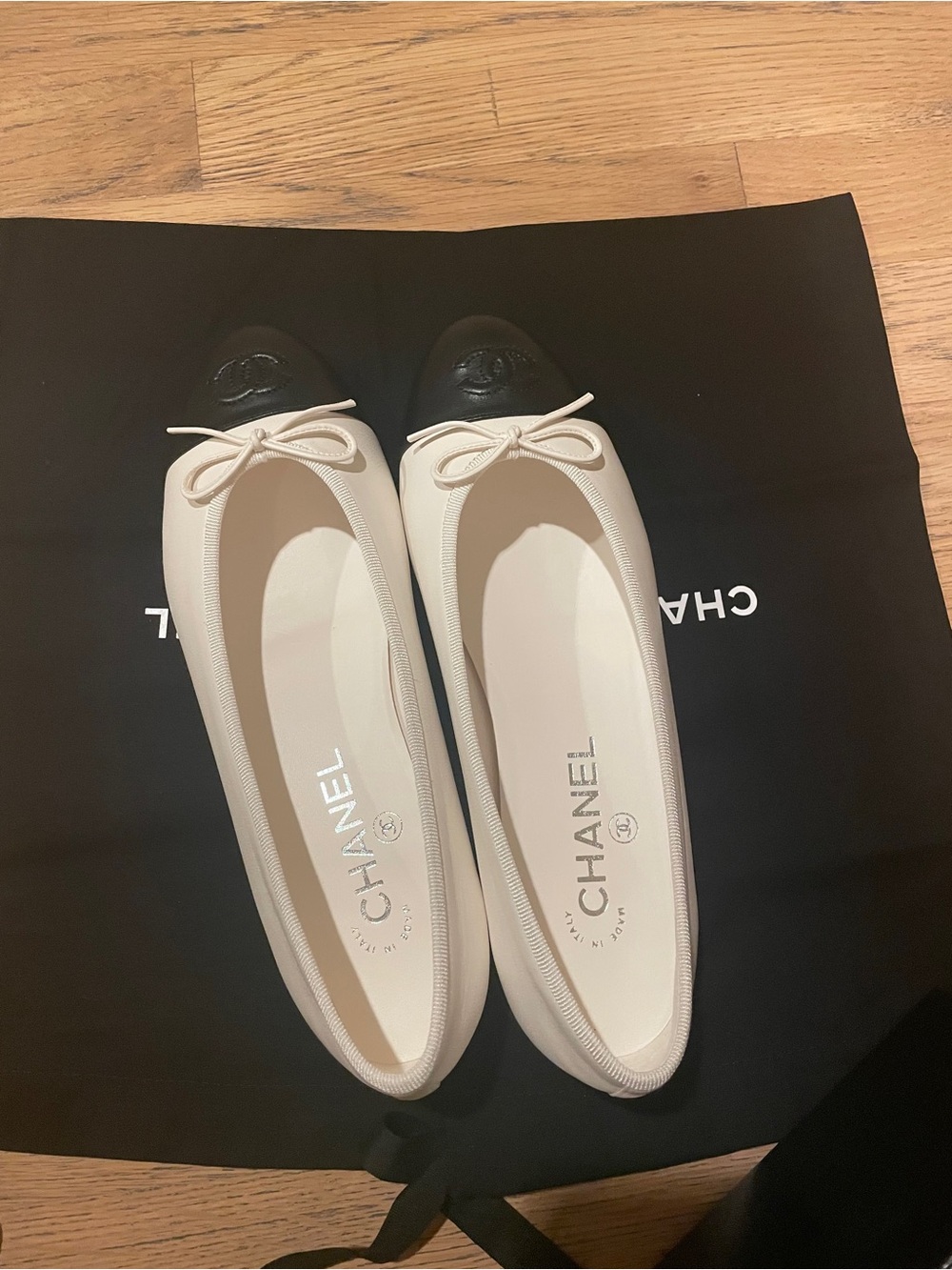 CHANEL Two-Tone Leather Cap-Toe Ballet Flats in Cream and Black - Picture 3 of 6